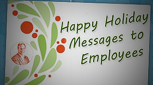 Person holding a mug with a Christmas message - happy holidays message to employees