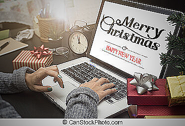 Person typing on a keyboard - happy holidays message to employees